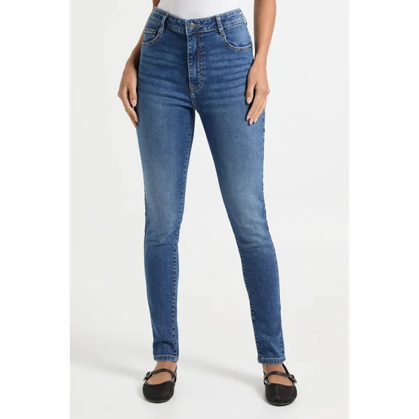 Jean skinny taille haute sculptant les fessiers