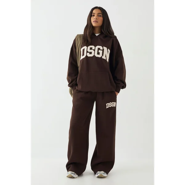 Jogging DSGN Studio à Jambes Droites avec Appliqué Cordon