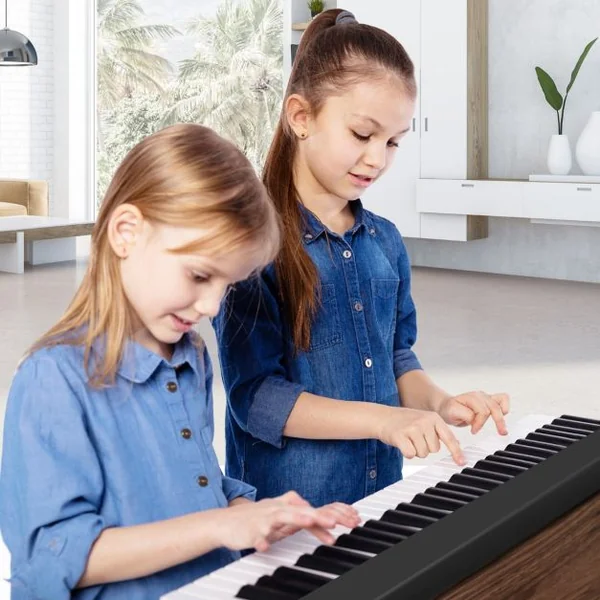 Piano Numérique 61 Touches Pliable avec 128 Sons & 128 Rythmes Clavier Électronique Portable avec Fonction Bluetooth Haut-Parleurs & Pédale de Sustain