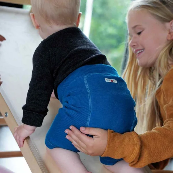 Shorty ManyMonths réversible - Surcouche bébé en mérinos – Coloris 2025/26